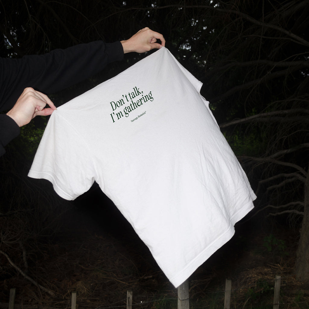 'DON'T TALK, I'M GATHERING' T-SHIRT: WHITE